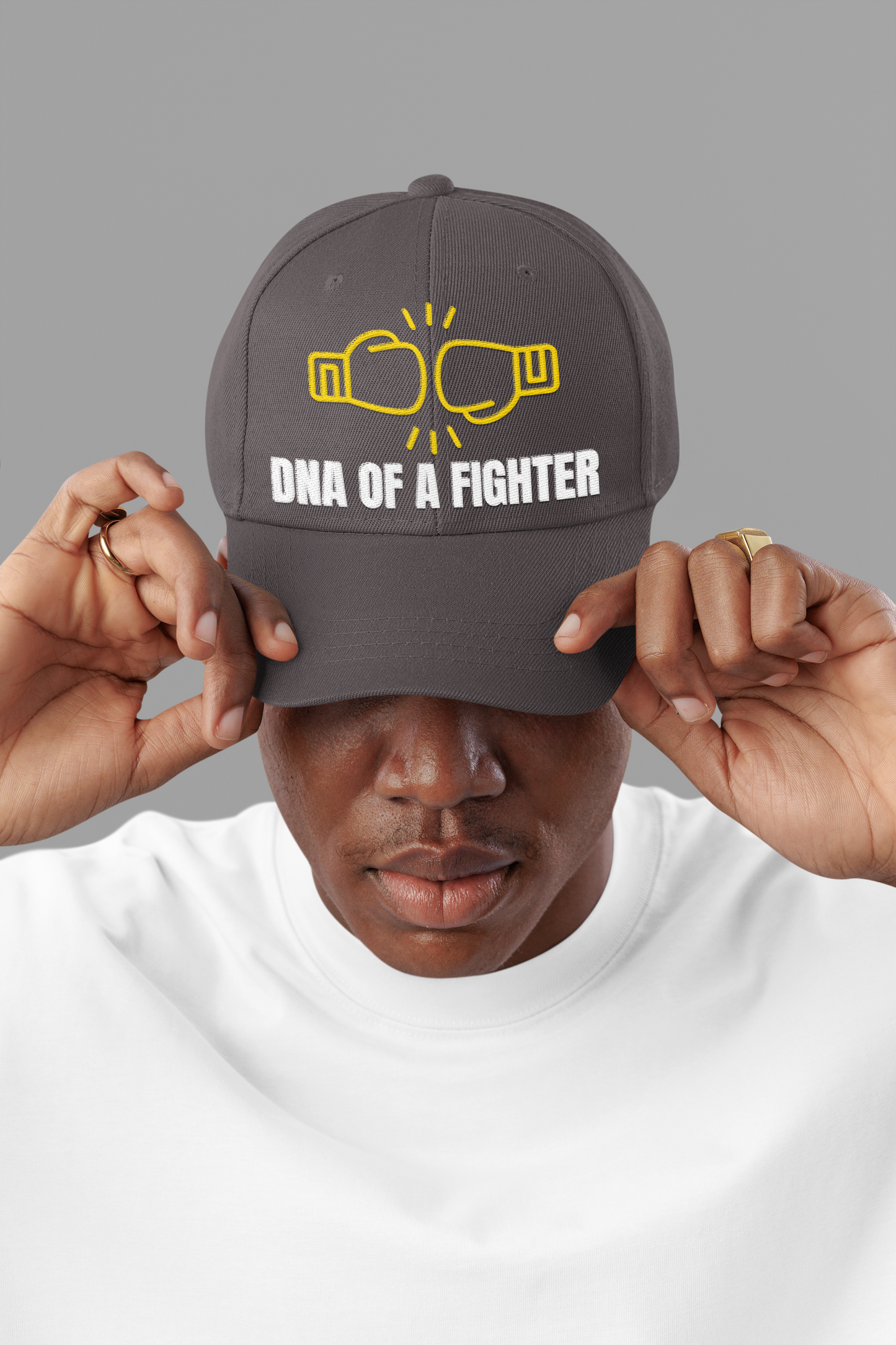 Gorra unisex de algodón bordada con el logo de DNA of a Fighter