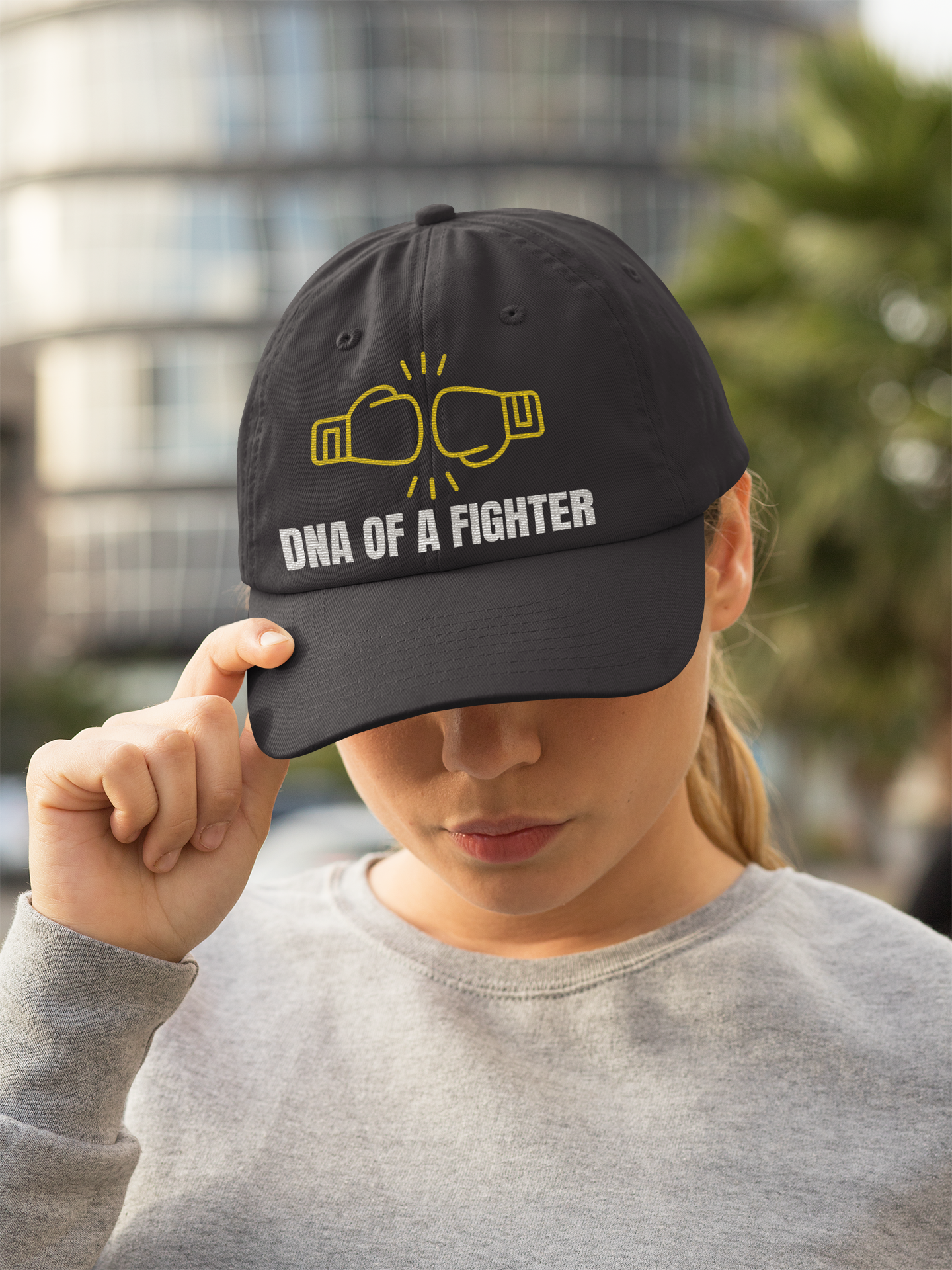 Gorra unisex de algodón bordada con el logo de DNA of a Fighter
