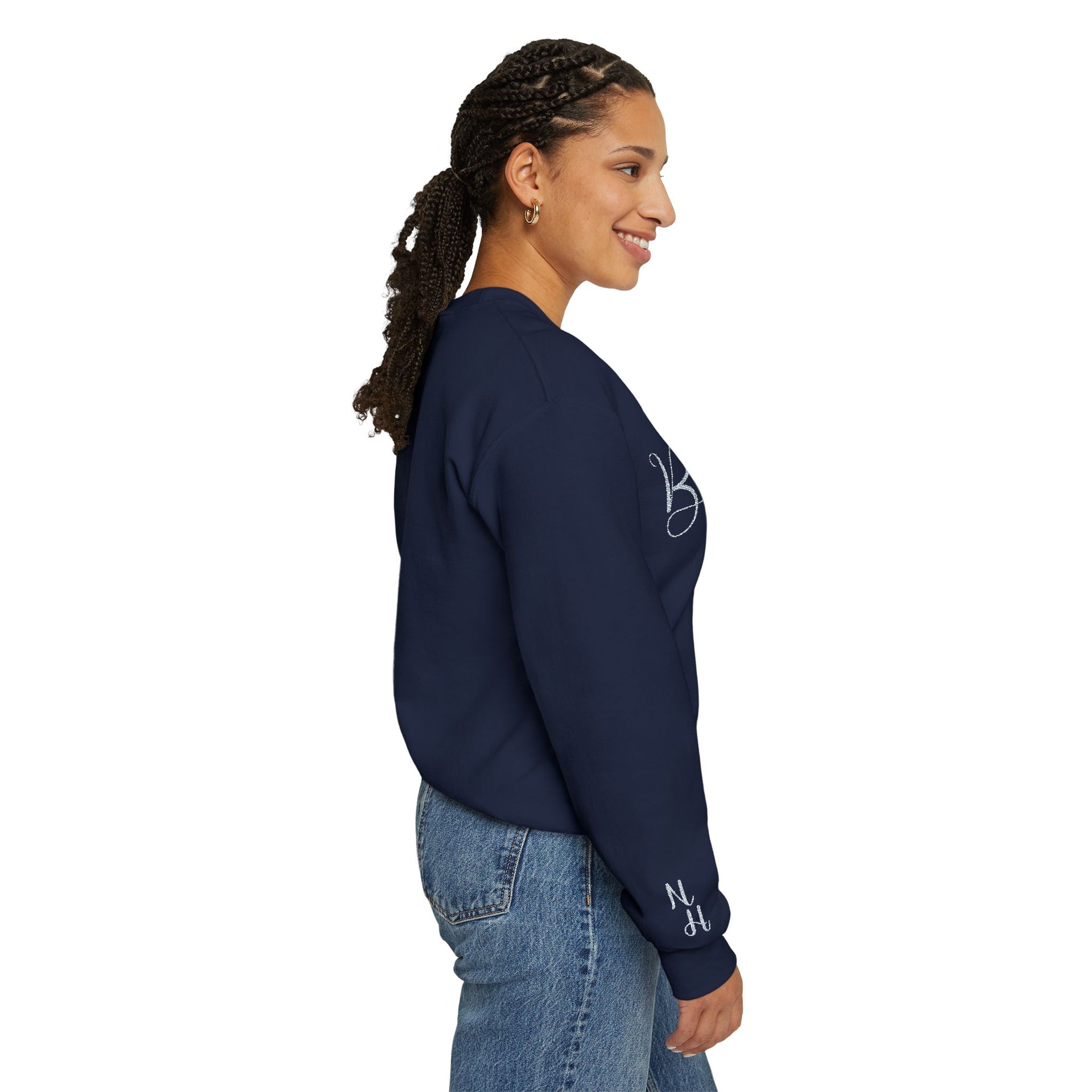 Woman side profile wearing navy Embroidered Kindness Sweatshirt
