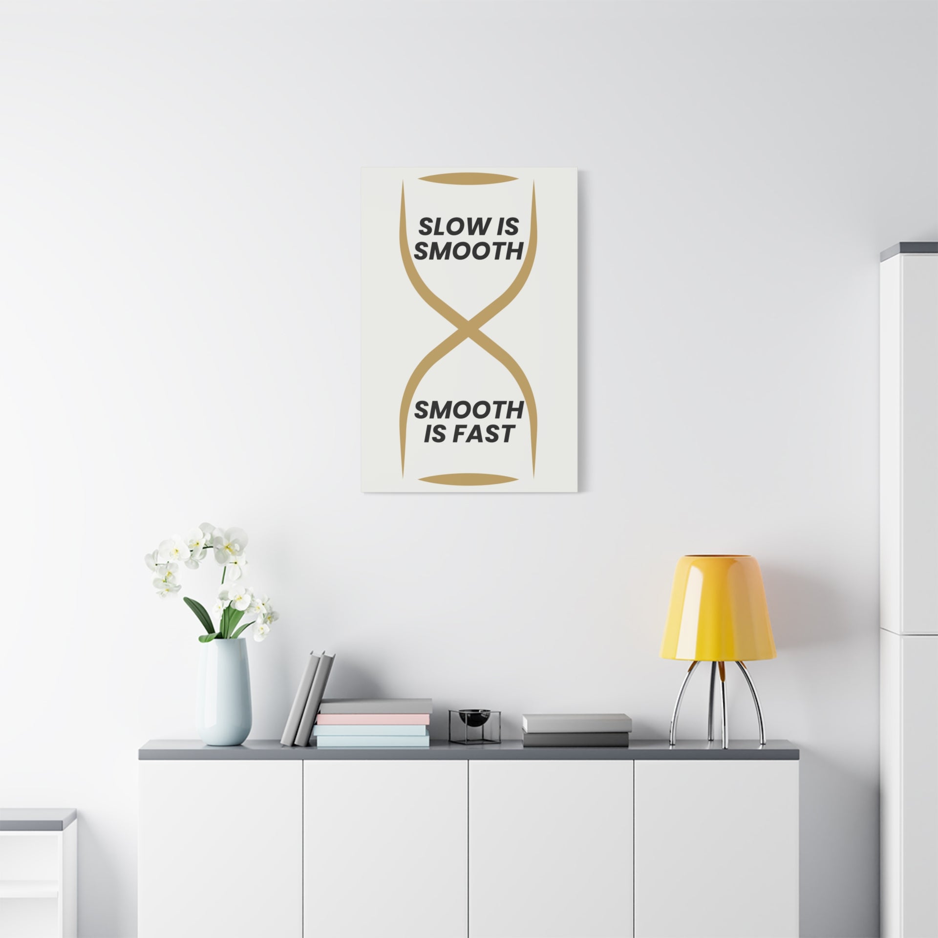 Minimalist Wall Art Slow Is Smooth - Inspirational wall print styled in a bright modern living room with white console and yellow lamp.