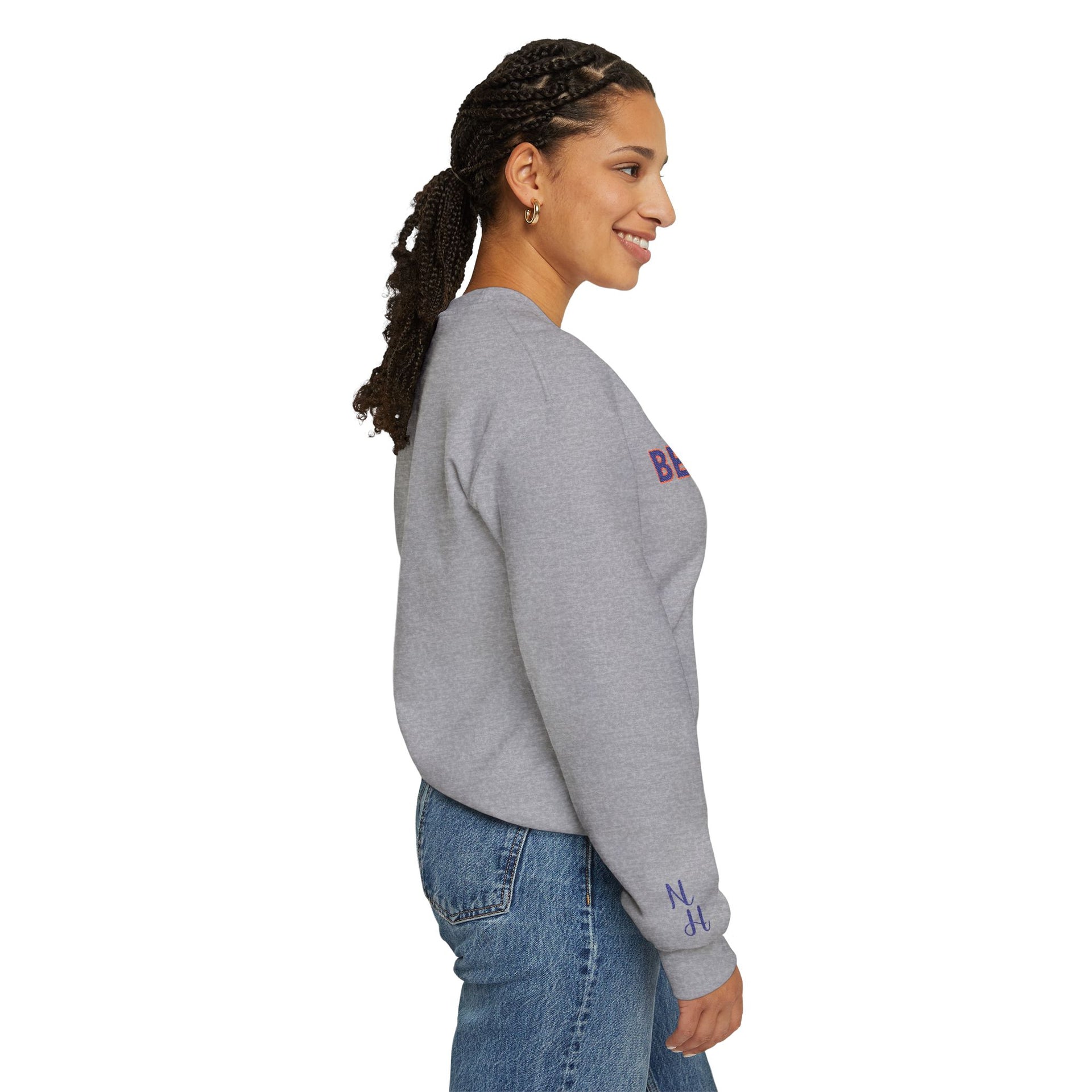 Side view of woman in grey Embroidered Motivational Sweatshirt