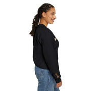 Woman side view wearing Embroidered Stay True Sweatshirt in black.