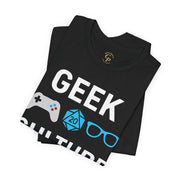 Flat lay of folded Geek Culture T-Shirt with gamer icons – black tee on white background