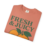 Rust red flat lay of Fresh and Juicy Oranges T Shirt featuring hand-drawn orange fruit