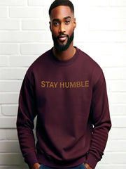 Woman wearing green Embroidered Humble Sweatshirt with gold script text