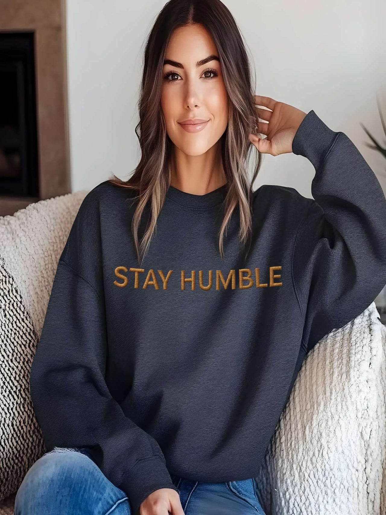 Woman wearing green Embroidered Humble Sweatshirt with gold script text