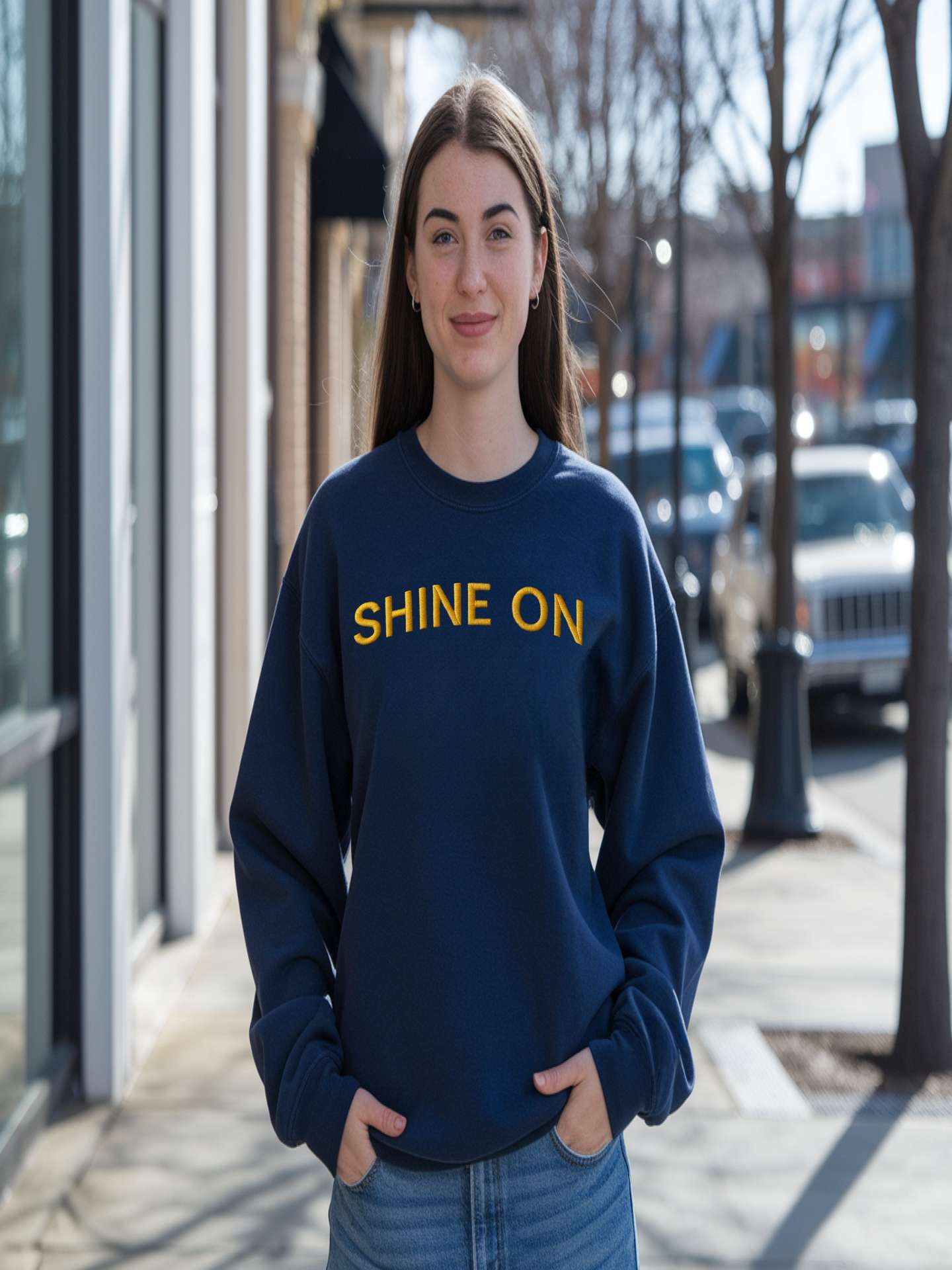 Woman walking outdoors in navy Embroidered Shine On Sweatshirt