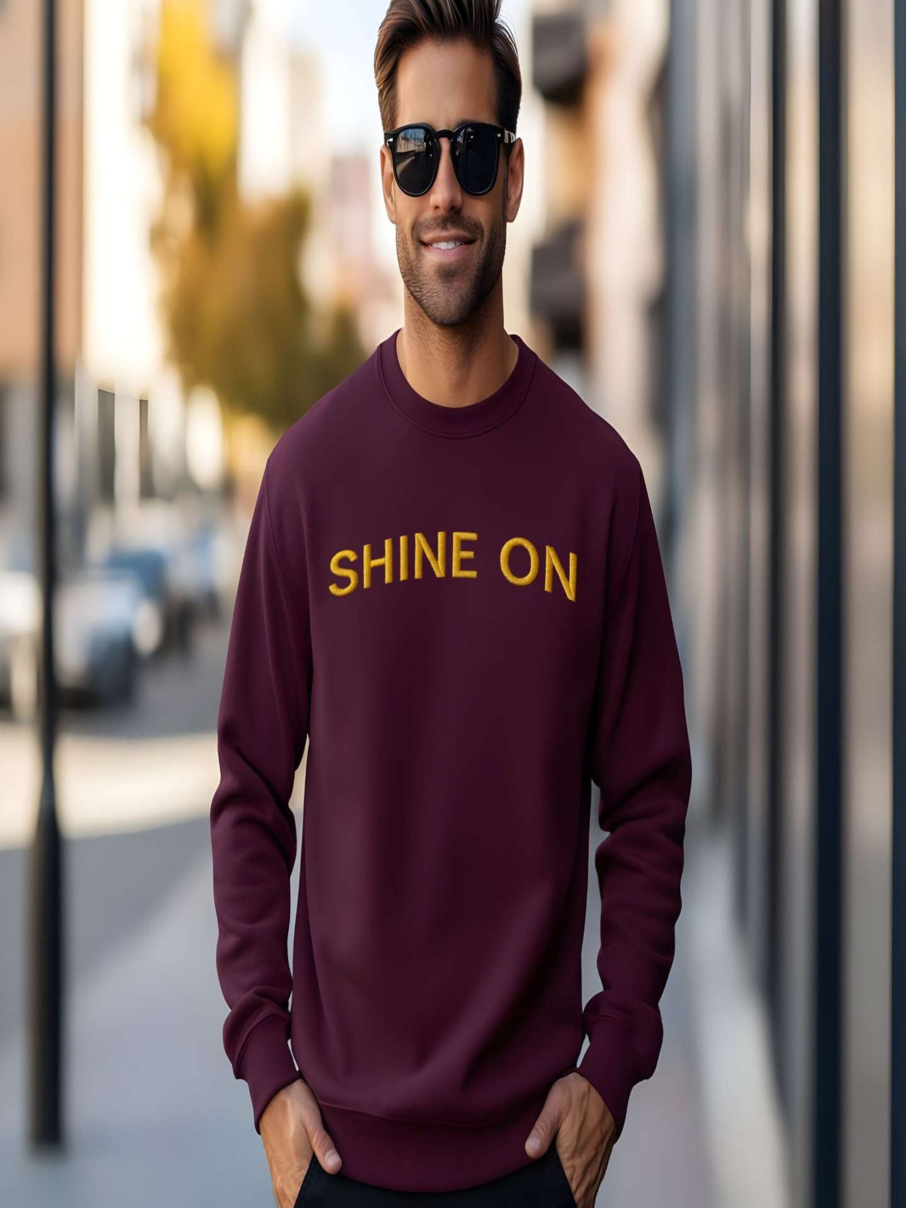 Man wearing Embroidered Shine On Sweatshirt in maroon color, street style