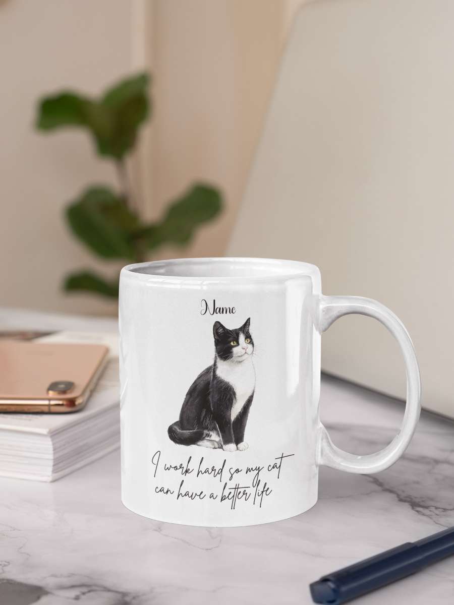 Personalized Pet Mug featuring black and white cat design on desk
