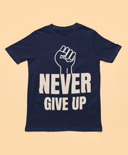 Motivational t-shirt featuring a bold 'NEVER GIVE UP' design with a raised fist graphic on a navy background.