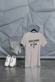 Chase Dreams T-Shirt on minimalist display with white sneakers