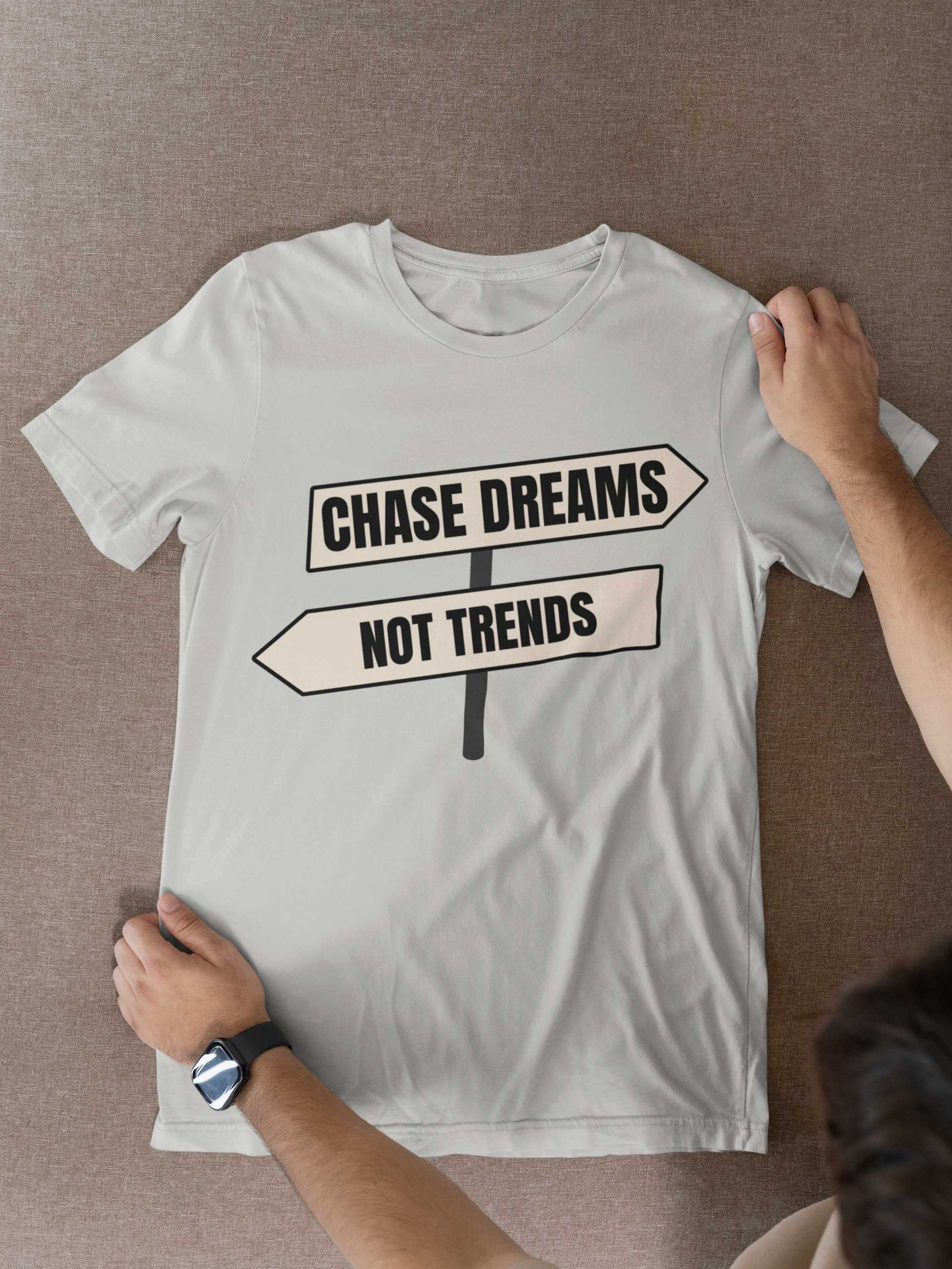 Chase Dreams T-Shirt flat lay on carpet with phone and shoes