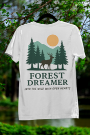 Close-up of Forest Dreamer T-Shirt on flat lay with forest design