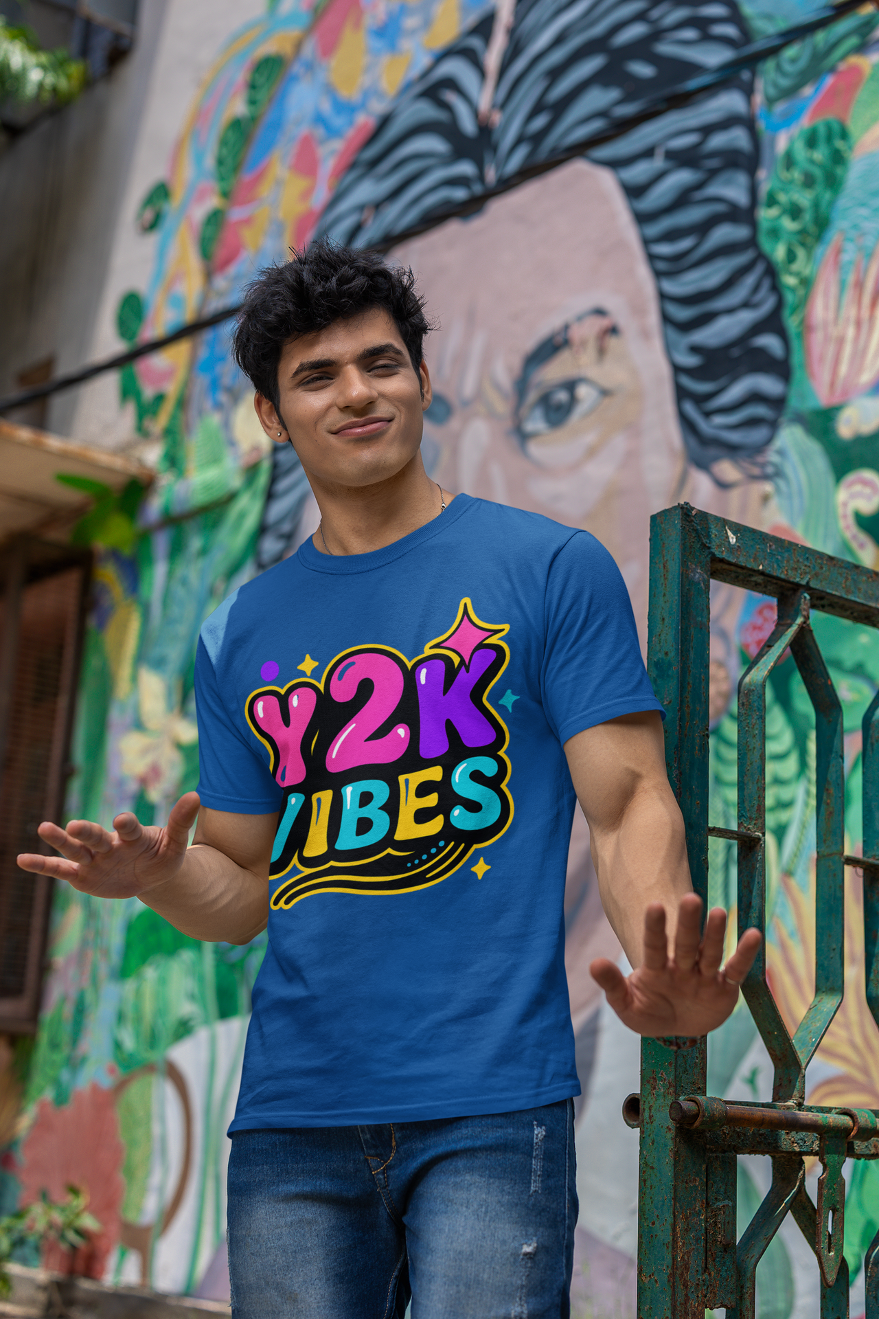 Y2K Vibes T-Shirt worn by man in front of colorful graffiti wall, Gen Z aesthetic