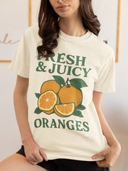 Woman wearing Fresh and Juicy Oranges T Shirt in white – retro fruit graphic tee