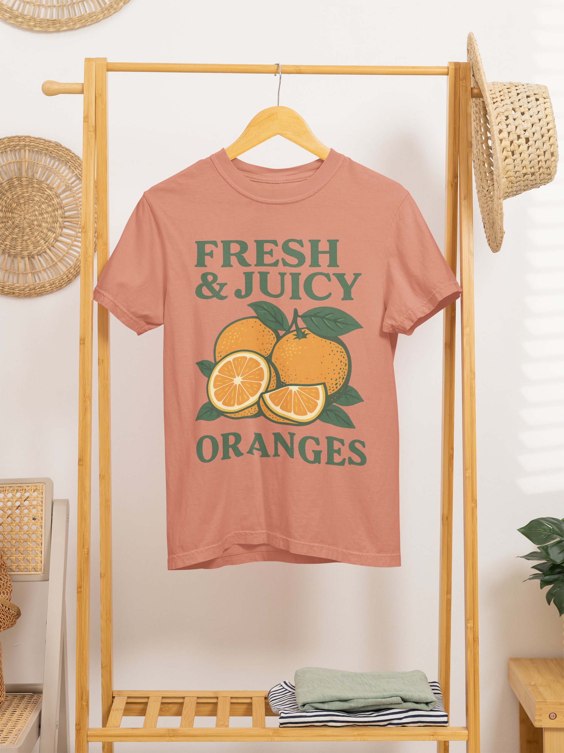 Fresh and Juicy Oranges T Shirt on hanger – retro fruit graphic on soft cotton tee