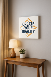 Wall Art Create Your Reality – Motivational wall art framed in a cozy desk corner with lamp and plant.