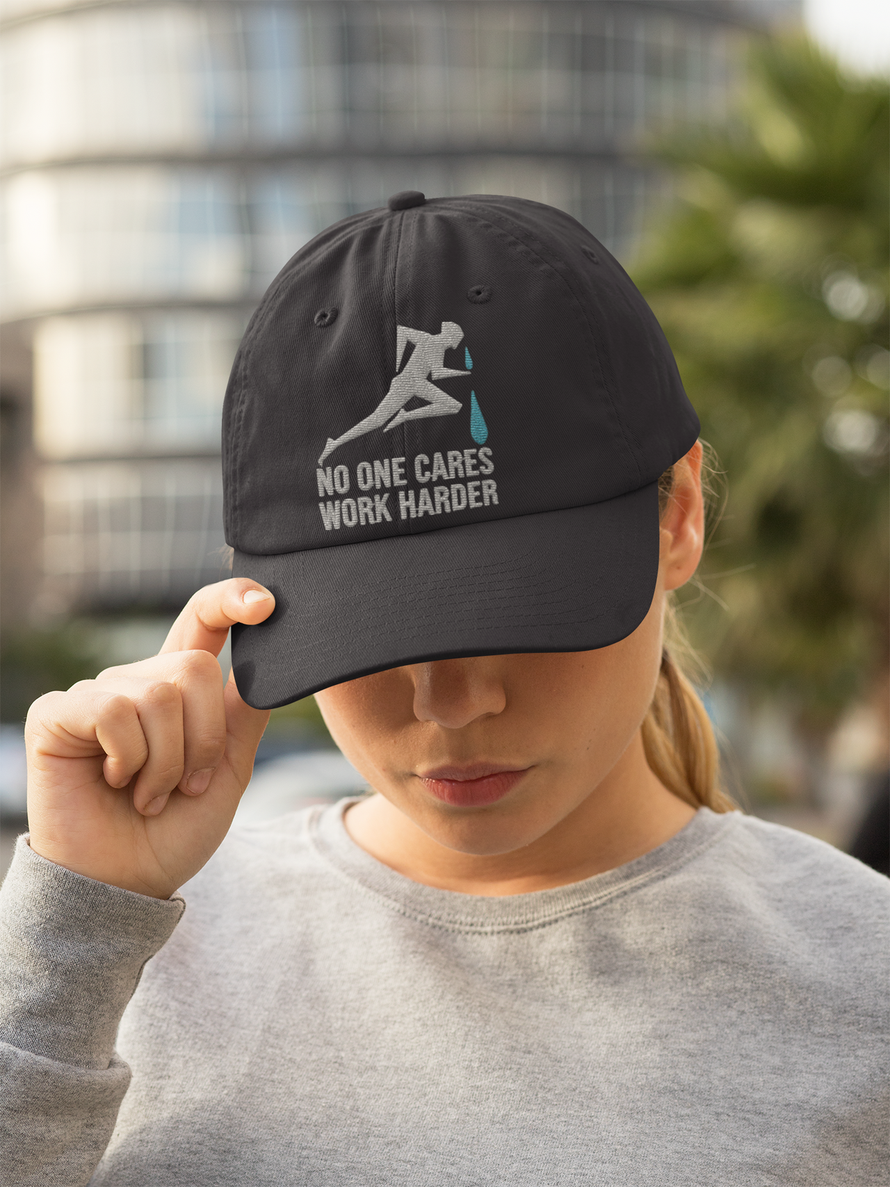 Embroidered Dad Hat motivational – Dark cap with athlete graphic and motivational embroidery design.