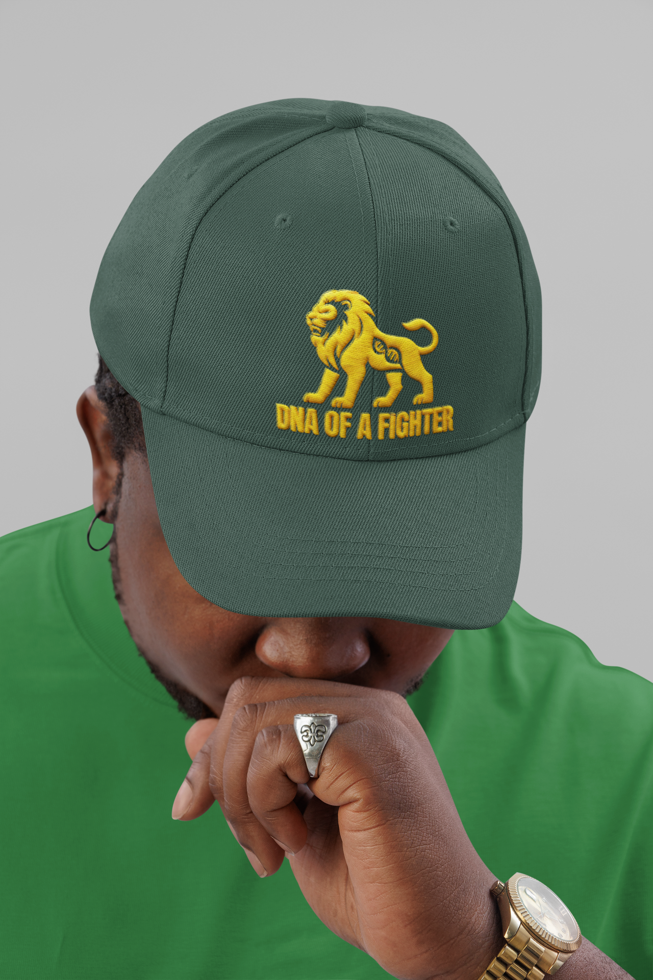 Dad Hat DNA of a Fighter Embroidered – Green unisex cap styled by man in streetwear look.