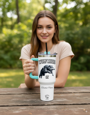Smiling woman outdoors with a Personalized Tumbler Wolf Mode in her hands.
