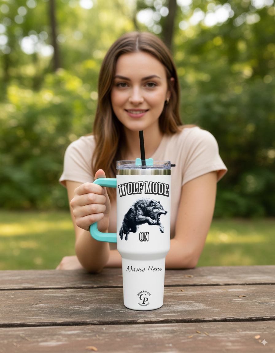 Smiling woman outdoors with a Personalized Tumbler Wolf Mode in her hands.