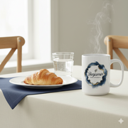 Personalized Mens Name Mug with the name 'Benjamin', steam rising, croissant, and glass of water on a table.