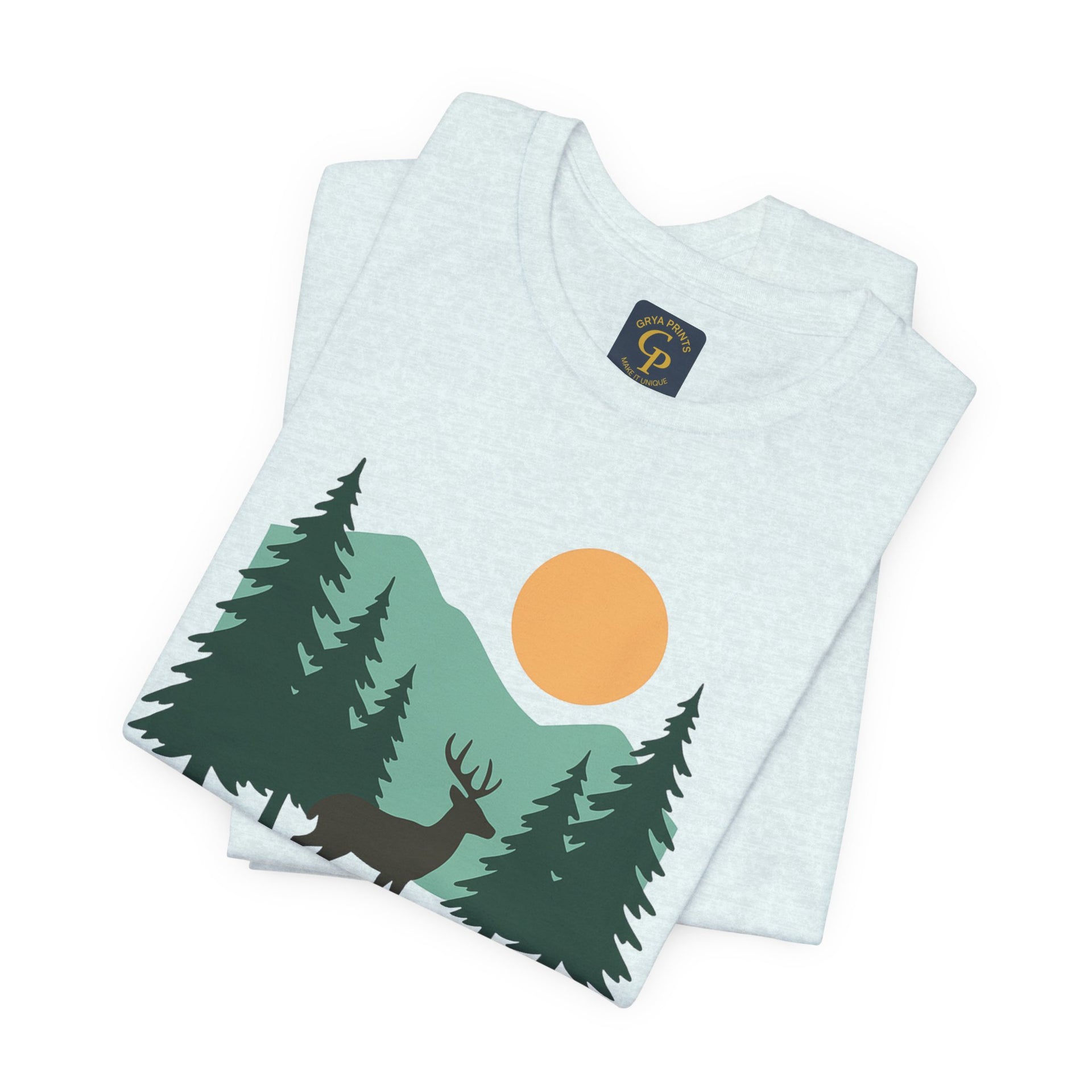 Forest Dreamer T-Shirt featuring a deer and forest scene with mountains and a sun, ideal for nature lovers.