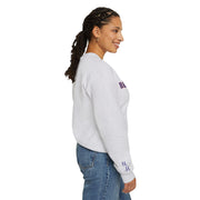 Woman wearing sand-colored Embroidered Motivational Sweatshirt, side profile
