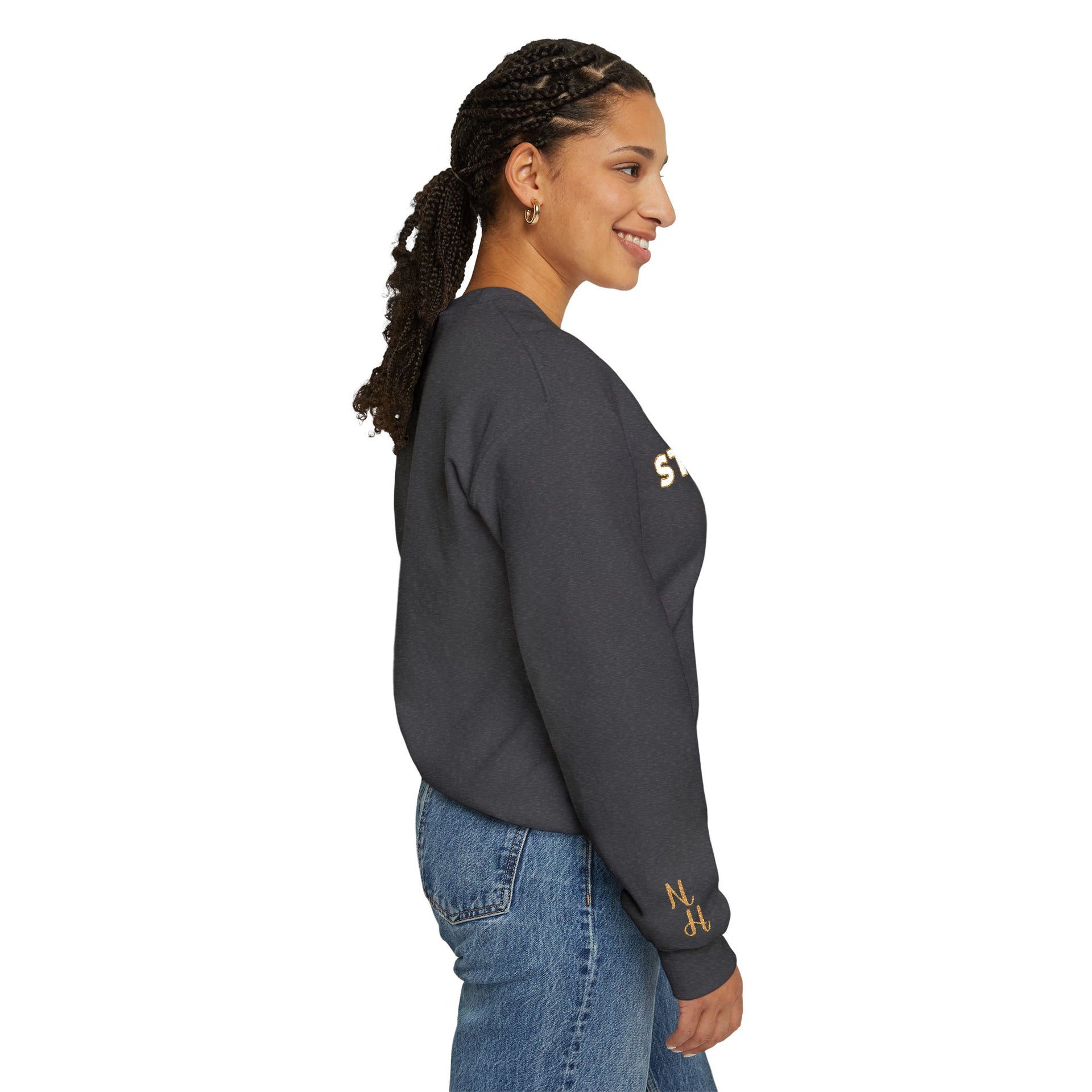 Woman side view wearing Embroidered Stay True Sweatshirt in dark heather gray.